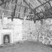 Beaton's Cottage, interior.  View of East end of cottage from North West.