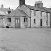 View of shop at corner of Victoria Street and St David Street, Kirkpatrick Durham, from south west