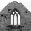 Fearn Abbey.  Ross aisle, detail of traceried window, North gable, from South.