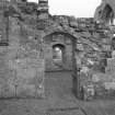 Fearn Abbey.  Ross aisle, view of doorway from East.