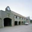 Athelstaneford Mains.
View of N side of steading from NE, including clock, bovine sculpture, and 1860 date plaque.