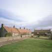 Athelstaneford Mains.
View from W of associated range farm cottages on E side of road.