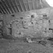 View of interior of threshing barn from North East.
