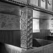 Interior.
Laird's loft, detail of carved wooden balcony support.