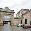 View of 'clock' entrance arch from SSW