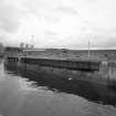 Kirkcaldy Harbour
View from south west of railway swing bridge across channel between outer and inner harbour, with dock gate also visible