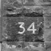 Detail of sign of building 34.