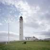 Barns Ness Lighthouse.
View from N of lighthouse, with flagpole in foreground.
