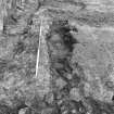 Excavation photograph : area F - slot running E-W cutting 44 in guard chamber.