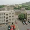 Elevated view of entrance to brewery courtyard from Horse Wynd with Holyrood Palace