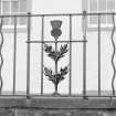 Detail of thistle ironwork on Queensberry House perimeter wall