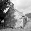 Detail of the Croft houses rounded SE corner with corbelled skew.