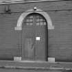 Edinburgh, Granton Gasworks, Engine shed/ mechanics workshops
Detail of arched doorway in W frontage