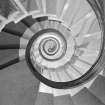 Paxton House, interior.  Spiral servants' staircase, view looking down centre of spiral.