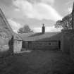 View of kitchen wing and servicve yard from North