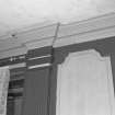 Interior. View of first floor South room/ drawing room showing a detail of the cornice and pilaster capital