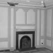 Interior.View of ground floor /North room dining room from South showing fireplace and panelling