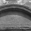 Detail of incised key motif on pediment with five keys