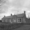 View from SE of housing (two dwellings named Minden and Raycot) at SW end of mill - possibly once housed mill offices.