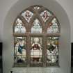 Interior.
View of stained glass window in north wall