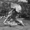 Lead sculpture by Charles Mackie in garden to South of main house, view from South West.