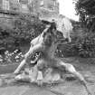 Lead sculpture by Charles Mackie in garden to South of main house, view from South West.