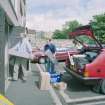 RCAHMS AT WORK.
RCAHMS staff unloading archive material in the RCAHMS car park.