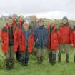 RCAHMS Muck Survey. The Muck survey team with the MacEwens of Port Mor House.