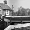 View of lock gates and the lock-keeper's cottage, Wyndford Lock, Forth and Clyde Canal, from west