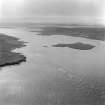 Oblique aerial view of Eynhallow Sound, Orkney, looking S.