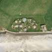 Oblique aerial view centred on the prehistoric settlement at Skara Brae, Orkney