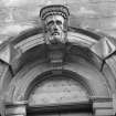 Detail of entrance arch of Tolbooth with carved head keystone, Broad Street, Stirling