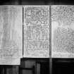 Photographic copy of three rubbings showing an incised cross from Iona and two detail of the Barochan Cross.
