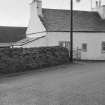 View of the Smithy, 74 Main Street, Glenluce, from north.