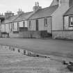 General view of 83-93 Main Street, Glenluce from east.