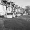 General view of 83-93 Main Street, Glenluce, from west.