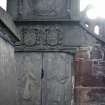 View of mural monuments with carved effigies and armorial panels, Arbroath Abbey Churchyard.