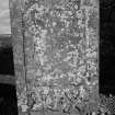 View of gravestone commemorating James Dougall 1787, Luncarty Old Parish Church, showing Winged soul, man with fishing rod, hourglass, skull and crossed bones.