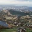 Oblique aerial view of Edinburgh, Holyrood Park centred on the remains of cultivation terraces, taken from the SE.