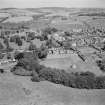 Oblique aerial view of Aberdour village, showing Aberdour Castle and dovecot and St Fillan's Church
