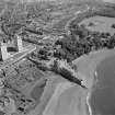 Oblique aerial view centred on Ravenscraig Castle, Kirkcaldy, showing Pathhead tower blocks from south west.