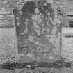 View of east face of gravestone of Thomas Findlay 1743 and his son Thomas 1750 in the churchyard of Rescobie Parish Church.