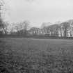 Photograph recording the site of Granton Gasworks, Edinburgh, prior to construction, looking W across the formerly enclosed area where No 1 Gasholder is now located .