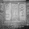 View of gravestone in wall dated 1717 in the churchyard of Clackmannan Parish Church.