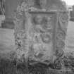 Detail of gravestone commemorating Anthony McHarg 1729 in the churchyard of Barr Old Parish Church.