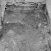 Excavation photograph : record shot of A, after removal of bedding of paving, looking east.