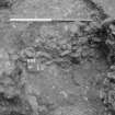 Excavation photograph : record shot - 609, cut fully excavated with 147, top fill of cut 613, looking north.