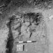 Excavation photograph : rubble in trench A, looking west.