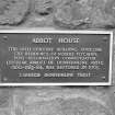 Plaque on front of house.