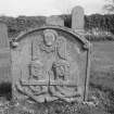 View of gravestone 1740 in the churchyard of Oxnam Parish Church.